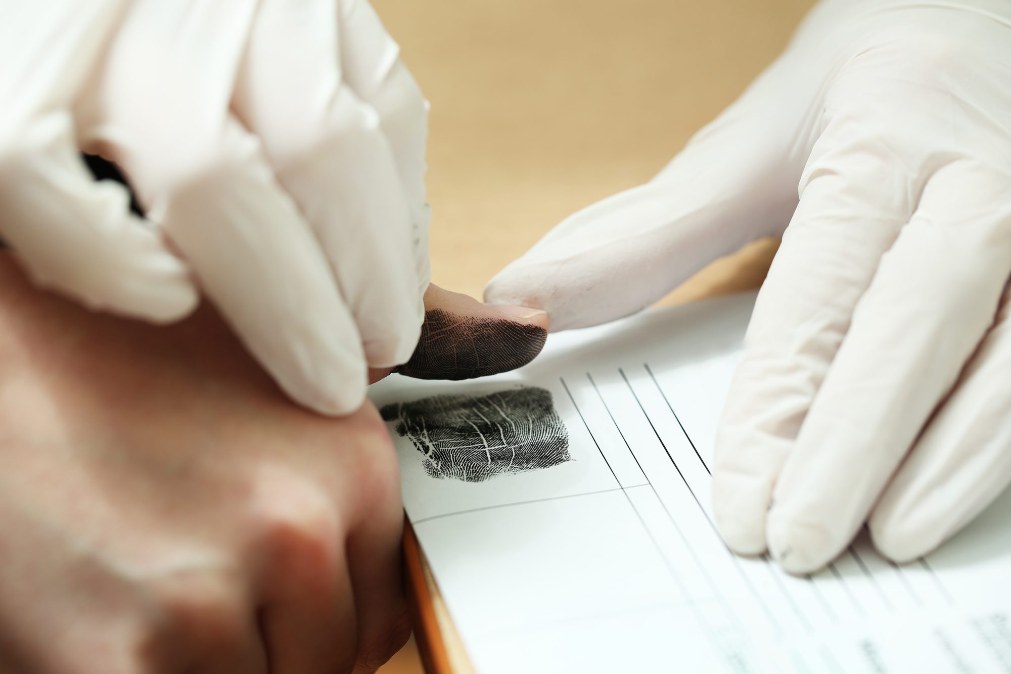 Fingerprints being taken for a SAPS police clearance certificate