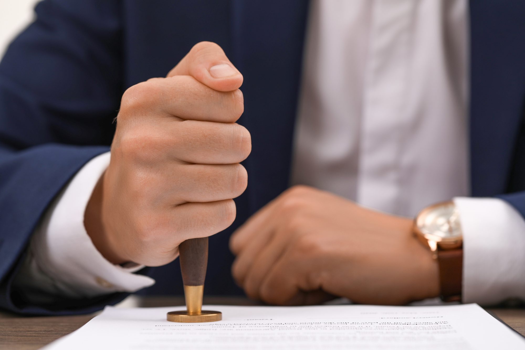 An official seal being stamped onto a document